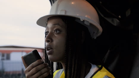 Woman-using-a-walkie-talkie