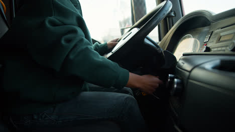 Young-woman-starting-the-truck