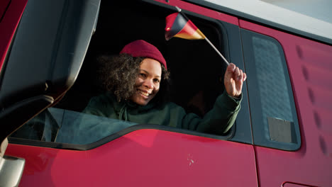 Woman-waving-Germany-flag