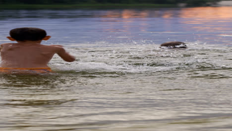 Father-and-son-swimming-in-the-lake