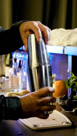 Bartender-preparing-a-cocktail