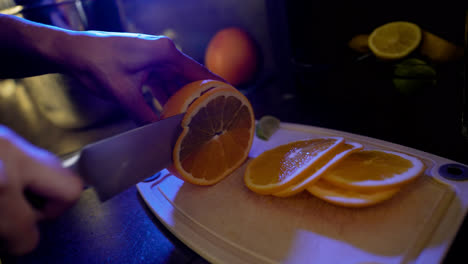 Bartender-cutting-an-orange