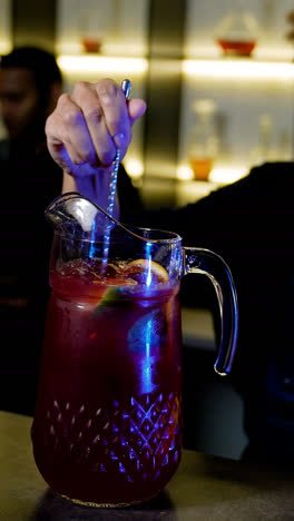 Bartender-preparing-a-cocktail