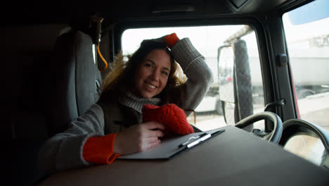 Young-driver-posing-inside-the-truck