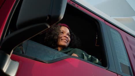 Young-woman-inside-of-a-truck