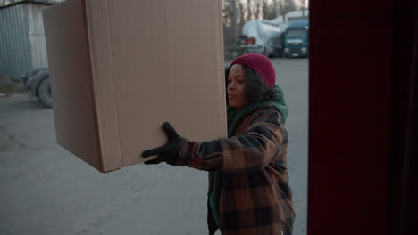 Two-workers-unloading-the-truck