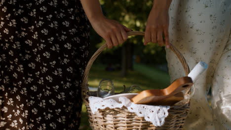Couple-carrying-picnic-basket