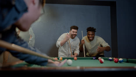 Happy-men-playing-snooker