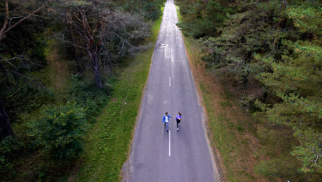 Couple-running-in-a-road