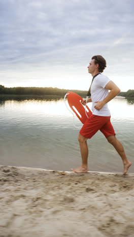 Side-view-of-male-lifeguard-at-the-beach