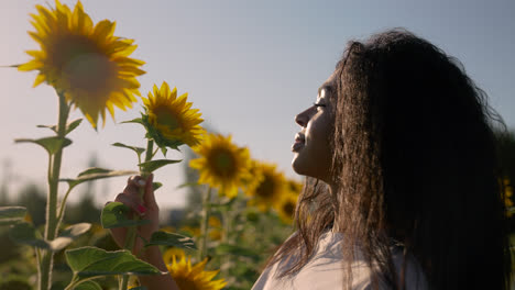 Young-woman-in-a-sunflower-field