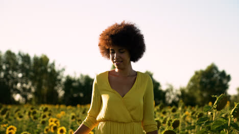 Young-woman-in-a-sunflower-field