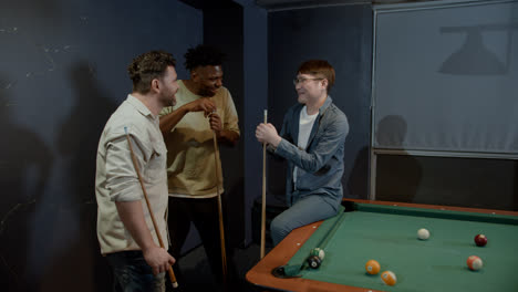 Happy-men-playing-snooker