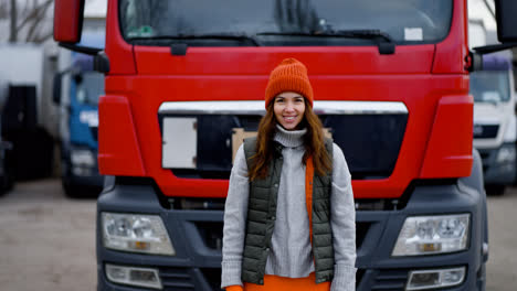 Woman-posing-at-the-front-of-the-truck