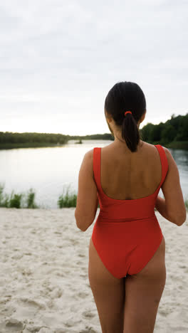 Back-view-of-female-lifeguard-at-the-beach
