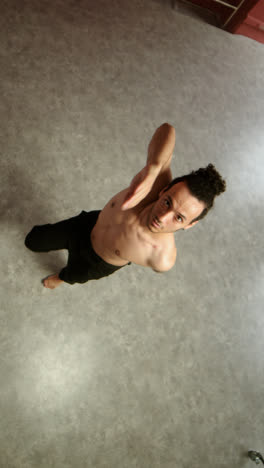 Young-man-dancing-in-a-classroom