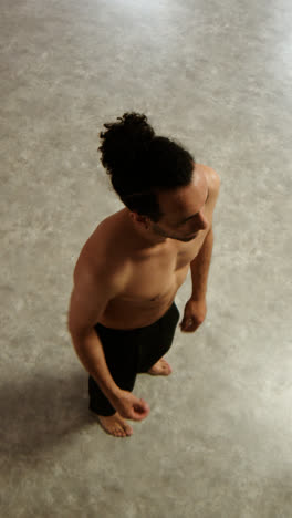 Young-man-dancing-in-a-classroom