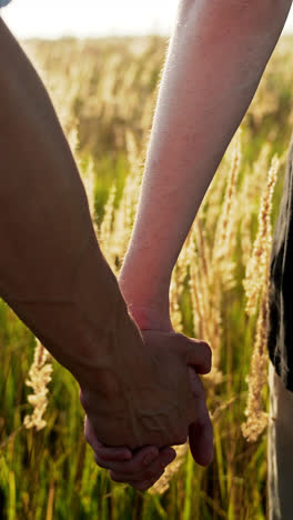 Closeup-men-holding-hands