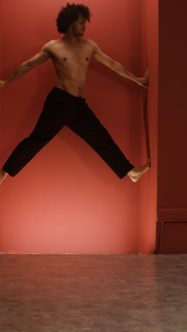 Young-man-dancing-in-a-classroom