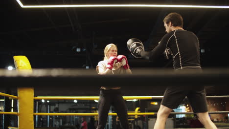 Sport-woman-boxing-at-gym