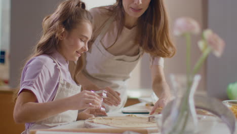 Mother-and-daughter-baking-cookies