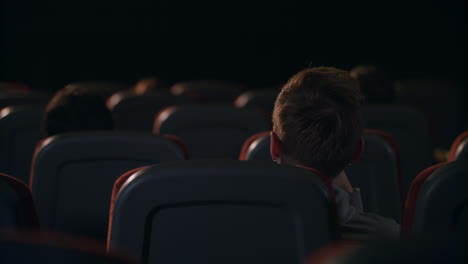 Back-view-of-people-sitting-in-seats-in-the-cinema