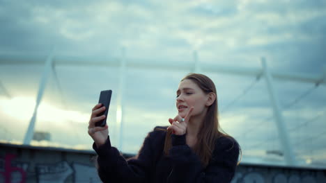 Girl-recording-video-on-smartphone