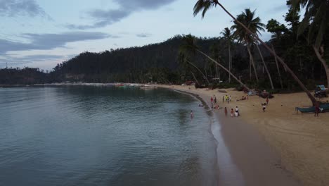 Island-life-and-natural-playground,-Filipino-Children-play-on-beach
