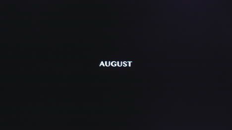 Das-Wort-„August-Monat“-Vibriert-Langsam-Und-Glitzert-Horizontal-Auf-Schwarzem-Hintergrund