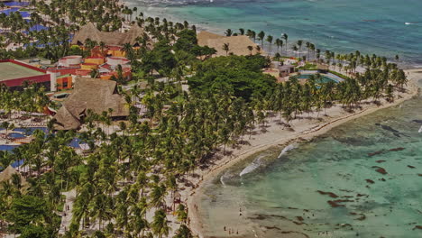 Puerto-Aventuras-Mexico-Aerial-v7-zoomed-shot,-flyover-coastline-capturing-seafront-resorts,-sandy-beach-and-tropical-landscape-with-pristine-turquoise-sea---Shot-with-Mavic-3-Pro-Cine---July-2023