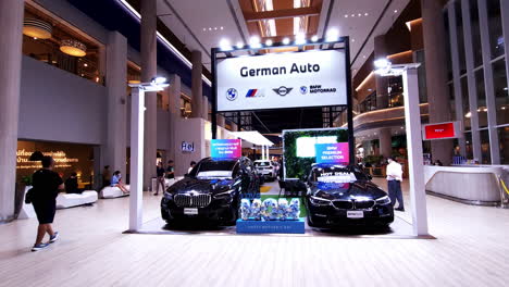 German-automobiles-on-display-for-a-car-show-inside-a-lobby-of-a-shopping-mall-in-Bangkok,-Thailand