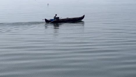 Aerial-drone-view-A-brother-is-going-to-pick-up-tourists-with-a-boat