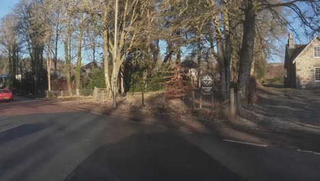 POV-shot-through-a-small-village-on-the-way-to-the-Isle-of-Skye-in-Scotland