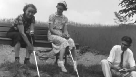 Friends-Rest-on-a-Golf-Course-Holding-Their-Clubs-in-New-York-1930s