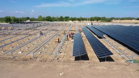 Aerial-drone-view-timelapses-where-men-are-installing-solar-panels