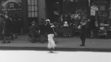 Boy-Carries-Trumpet-and-Crosses-the-Street-in-New-York-in-1930s