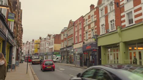 Shopping-street-in-a-quiet-area-of-London,-UK