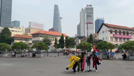 Teen-Vietnamese-students-wearing-traditional-costumes-'Ao-Dai'-for-their-yearbook-photos-in-Ho-Chi-Minh-City,-Vietnam