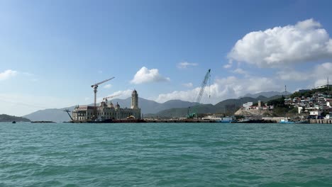 Point-of-view-from-the-tender-boat-arriving-in-Nha-Trang,-Vietnam