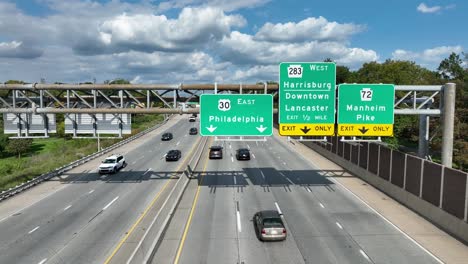 Philadelphia-road-sign-above-highway-in-Pennsylvania-on-beautiful-day