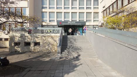 People-walking-in-and-out-of-a-Clinic-in-Sofia,-Bulgaria