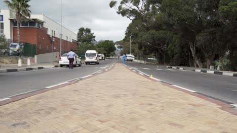 Wide-shot-of-murder-crime-scene-with-detectives-collecting-evidence