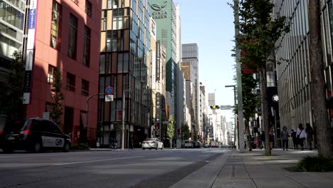 The-ground-level-perspective-of-Ginza-Street,-Tokyo,-Japan