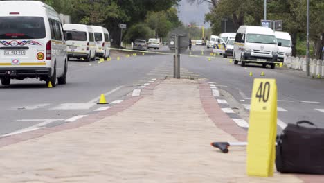 Police-evidence-markers-at-drive-by-shooting-crime-scene-in-South-Africa