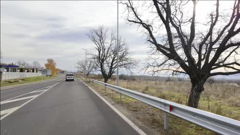 Passing-the-sign-marking-the-start-of-the-village