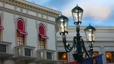 Wrought-iron-lamp-post-and-building-exterior,-Las-Vegas-Venetian-hotel-casino-in-daytime