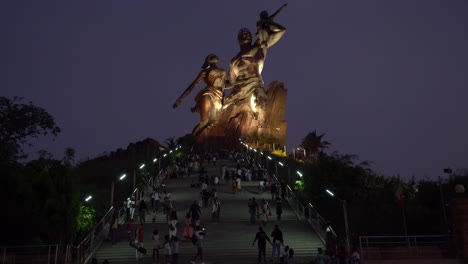 Night-time-view-of-the-Monument-de-la-Renaissance-Africaine-in-Dakar,-Senegal