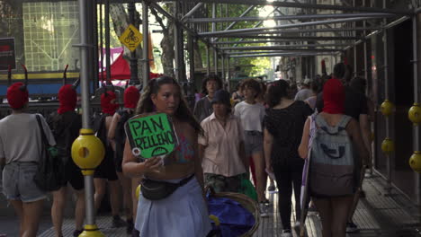 women-protestor-with-mask-walk-in-public-protest-at-abortion-rally