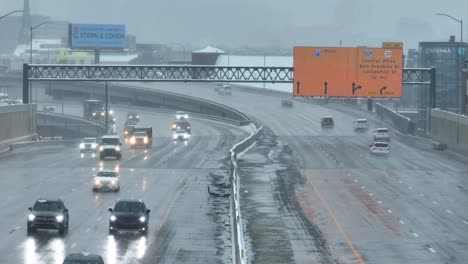 Aerial-view-of-cars-driving-on-a-highway