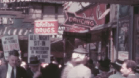 People-with-Placards-Walk-in-Protest-on-Downtown-New-York-Streets-in-1930s